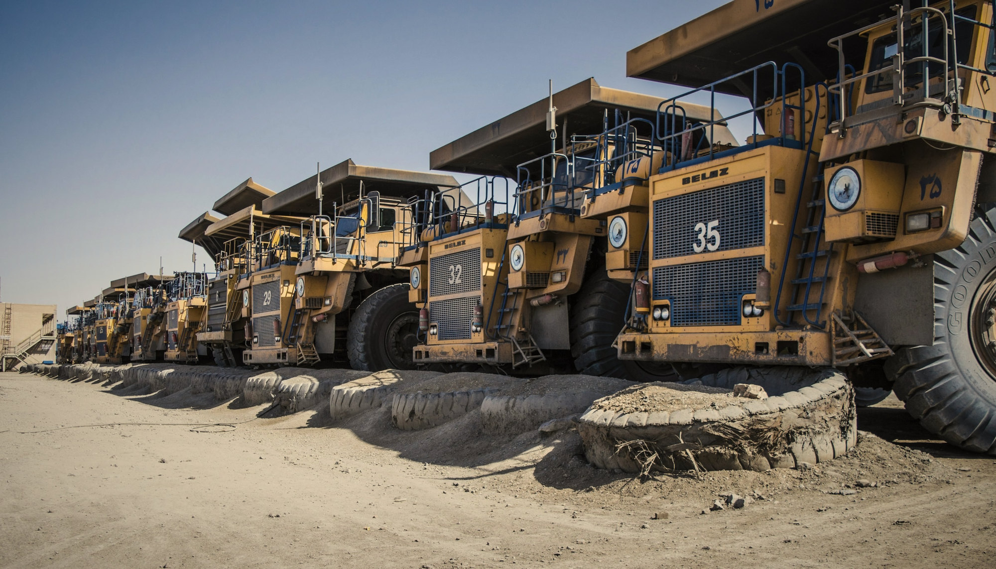 A row of haul trucks